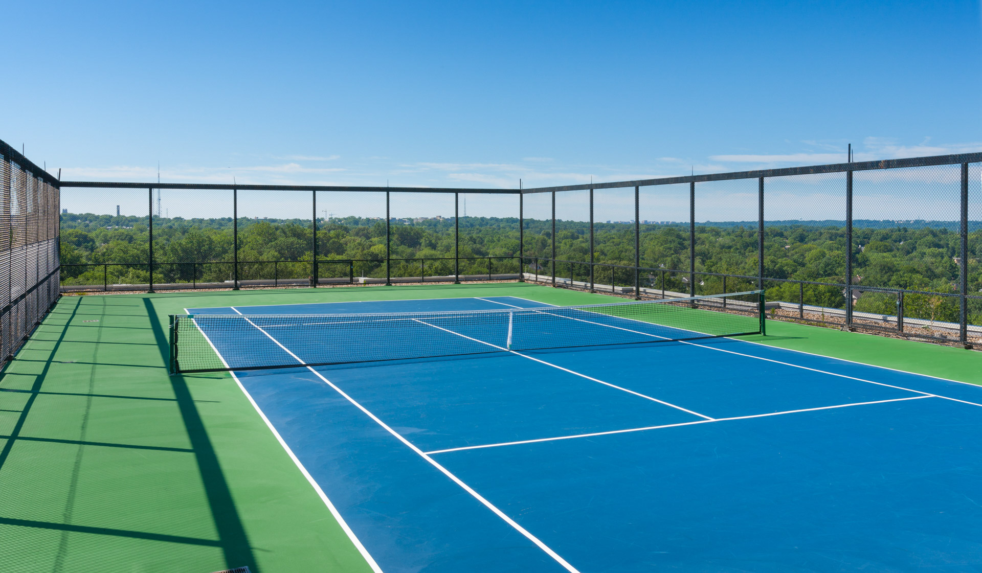 Willard Towers - Chevy Chase, MD - Person playing tennis